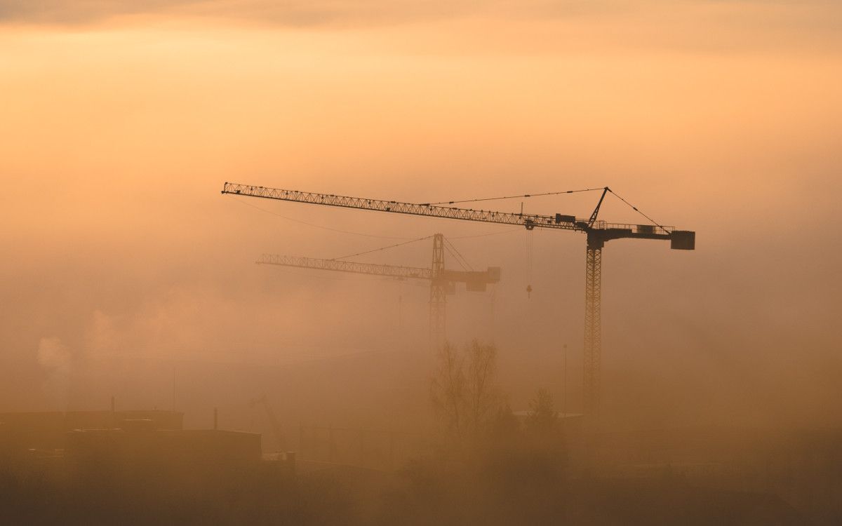 Ruby on Rails continuous integration and delivery represented by crane Photo by Verstappen Photography on Unsplash