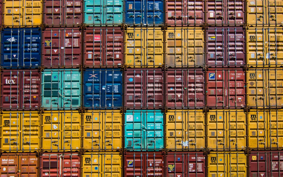 asdf and Docker local development setup is represented by containers Photo by Guillaume Bolduc on Unsplash