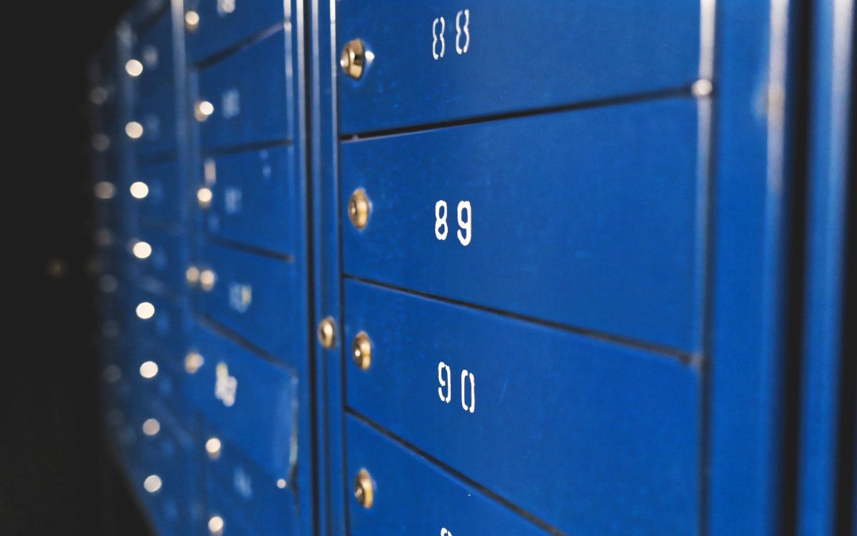 Heroku PostgreSQL to S3 backups system is represented by a secure locker. Photo by Roman Synkevych on Unsplash