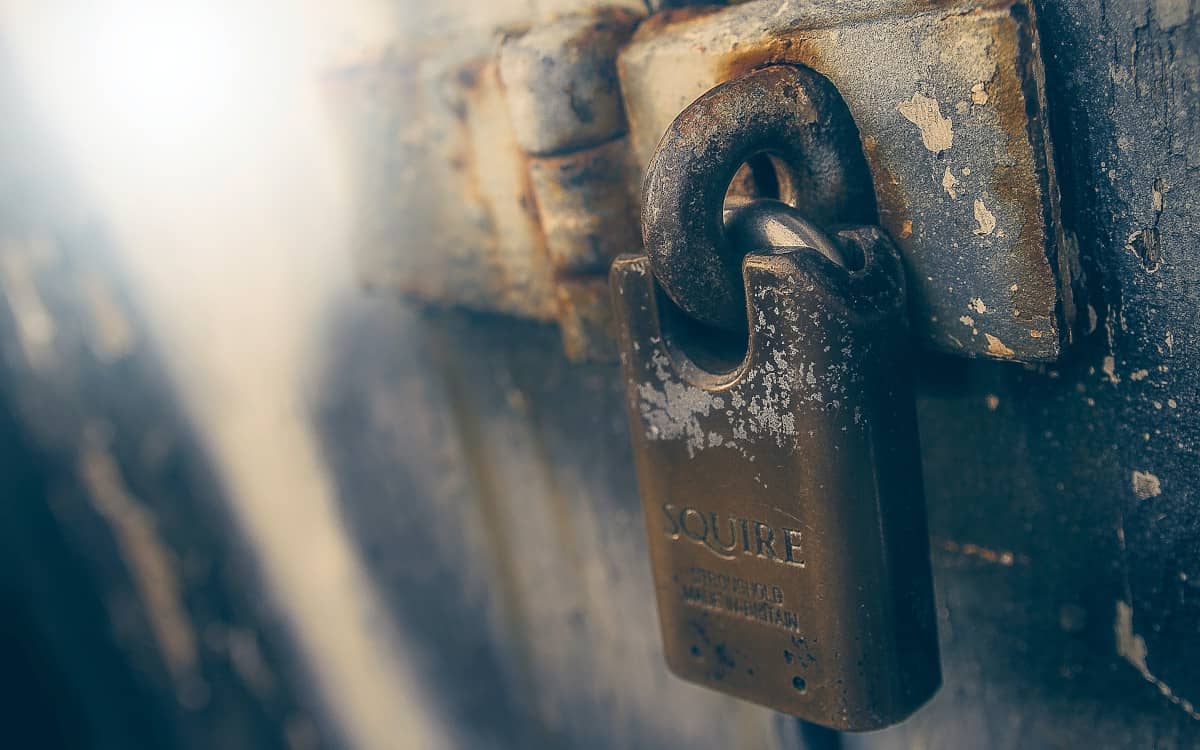 Redundant database backups for AWS RDS are represented by a padlock Photo by James Sutton on Unsplash